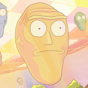 Large floating yellow head with wide eyes and a blank stare